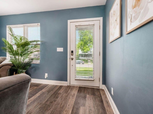 121 Haldy Ave, Columbus, OH 43204 - doorway to outside featuring wood finished floors and baseboards