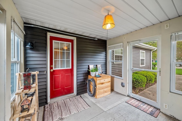 doorway to property with covered porch