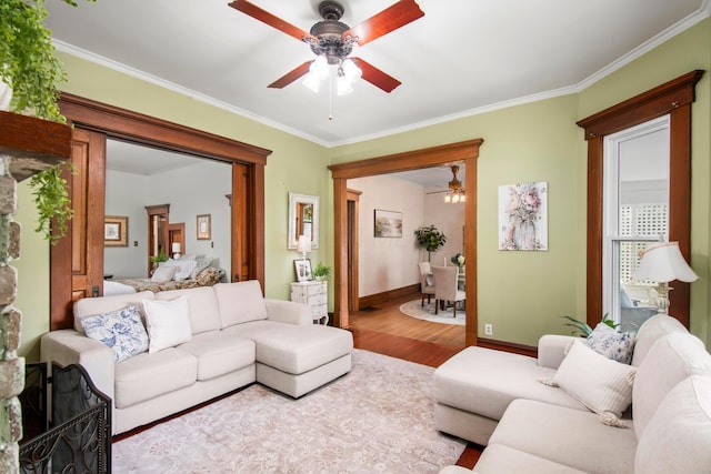 6 Town St, Pataskala, OH 43062 - living area with a ceiling fan, wood finished floors, ornamental molding, and baseboards