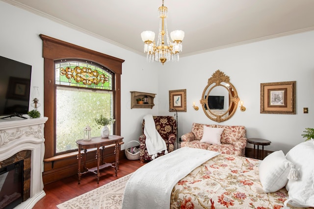 6 Town St, Pataskala, OH 43062 - bedroom featuring a chandelier, wood finished floors, crown molding, and a glass covered fireplace