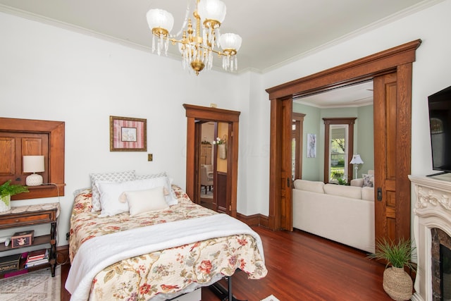 6 Town St, Pataskala, OH 43062 - bedroom with dark wood finished floors, ornamental molding, a chandelier, and baseboards