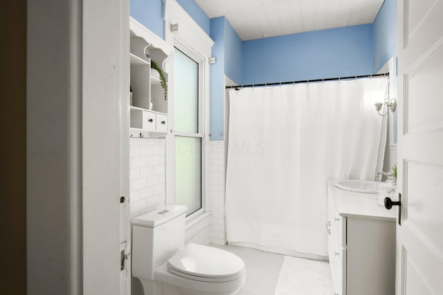6 Town St, Pataskala, OH 43062 - bathroom featuring vanity, toilet, tile patterned floors, and shower / bath combination with curtain