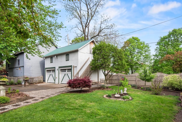 6 Town St, Pataskala, OH 43062 - exterior space featuring asphalt driveway, a garage, and stairway