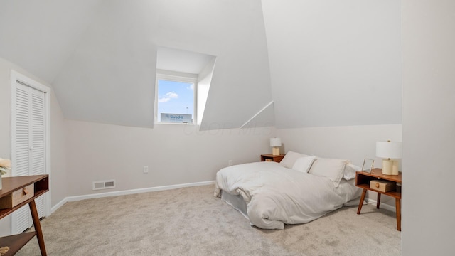 502 Hamilton Ave, Columbus, OH 43203 - carpeted bedroom with lofted ceiling and baseboards