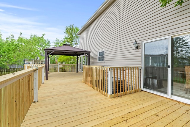 wooden deck with a gazebo