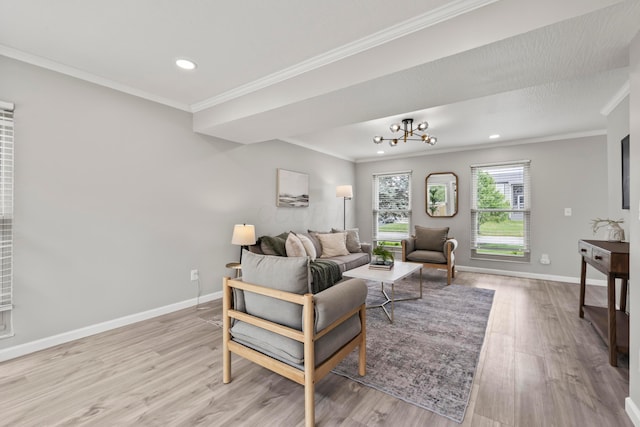 living room with crown molding, baseboards, recessed lighting, and light wood-style flooring