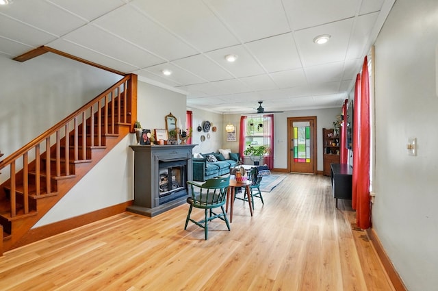 interior space with wood finished floors, stairway, baseboards, and recessed lighting