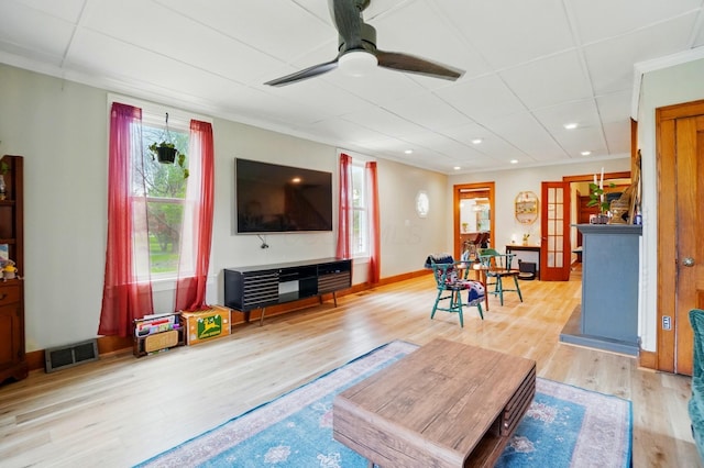 living room featuring ceiling fan, recessed lighting, visible vents, and wood finished floors
