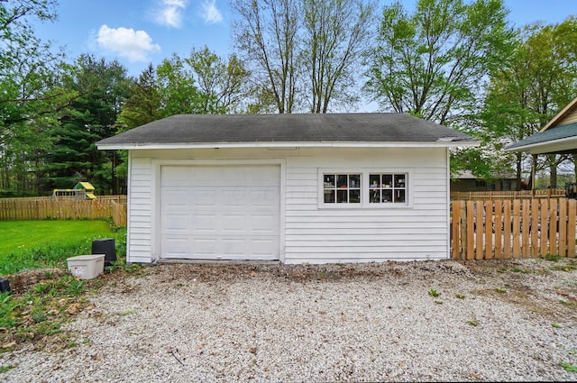 detached garage with fence