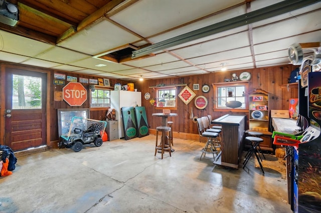 interior space featuring wood walls