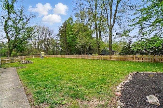 view of yard with a fenced backyard