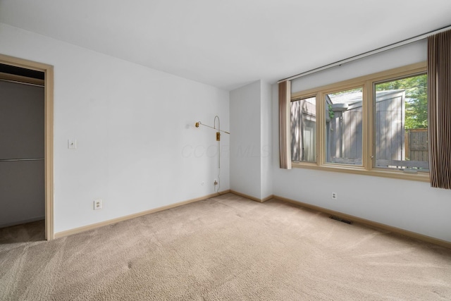 1624 Coppertree Ln, Columbus, OH 43232 - unfurnished bedroom featuring carpet floors and baseboards