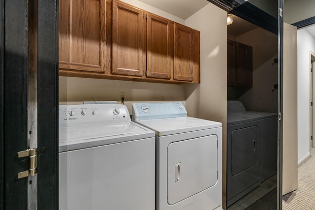 1624 Coppertree Ln, Columbus, OH 43232 - clothes washing area with washing machine and dryer and cabinet space