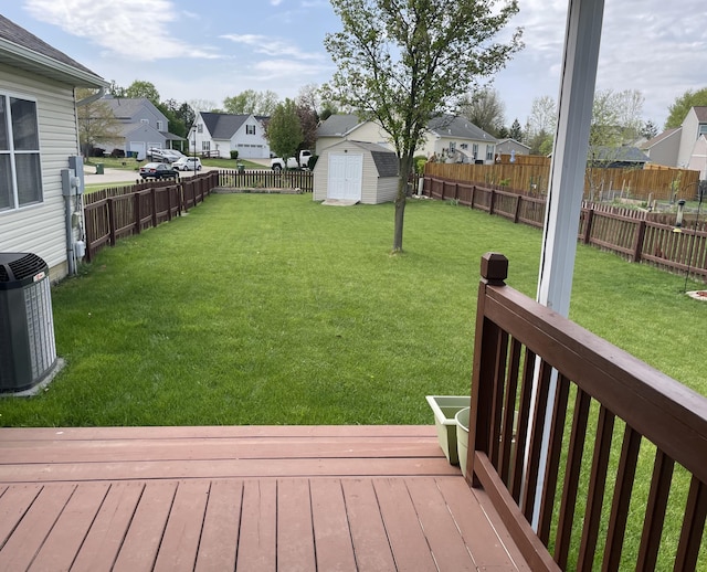 1554 Claudia Ln, Marysville, OH 43040 - view of yard featuring a residential view, a wooden deck, and central AC unit