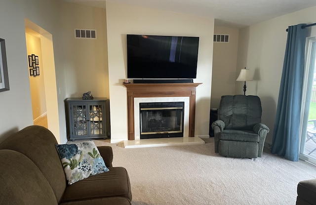 1554 Claudia Ln, Marysville, OH 43040 - carpeted living area featuring a fireplace