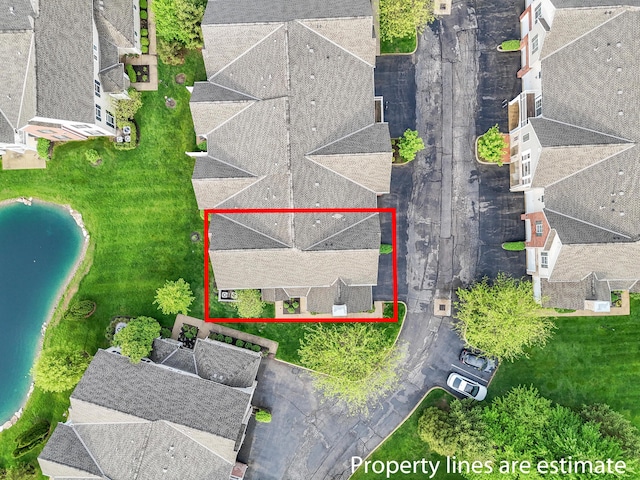 birds eye view of property with a residential view