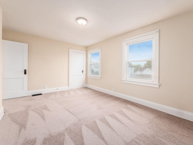 294 E Morrill Ave, Columbus, OH 43207 - carpeted spare room featuring baseboards