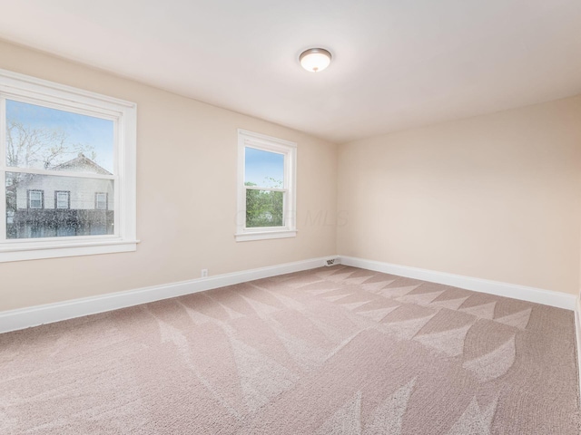 294 E Morrill Ave, Columbus, OH 43207 - carpeted empty room with baseboards