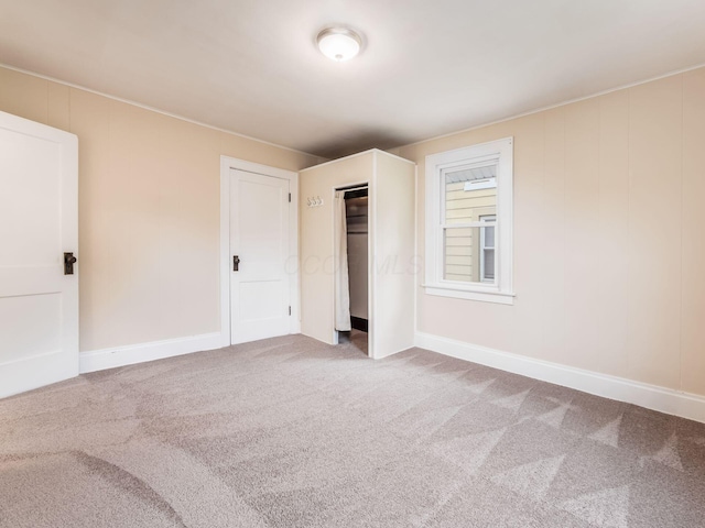294 E Morrill Ave, Columbus, OH 43207 - unfurnished bedroom featuring carpet, a closet, and baseboards