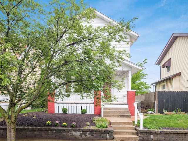 294 E Morrill Ave, Columbus, OH 43207 - view of property hidden behind natural elements featuring fence