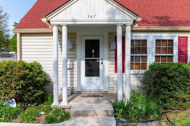 247 Bank St, Mount Gilead, OH 43338 - property entrance with a shingled roof and a porch