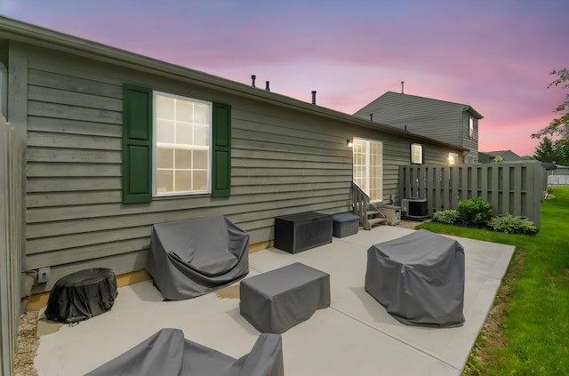 9137 Parkpoint Ln, Lewis Center, OH 43035 - patio terrace at dusk with a patio and central AC unit