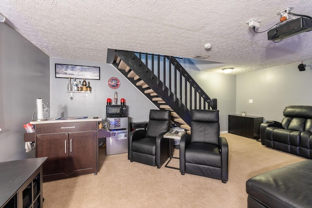 9137 Parkpoint Ln, Lewis Center, OH 43035 - living area featuring light carpet, stairway, and a textured ceiling