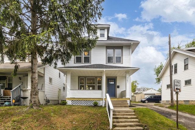 147 N Ogden Ave, Columbus, OH 43204 - american foursquare style home featuring a shingled roof and a porch