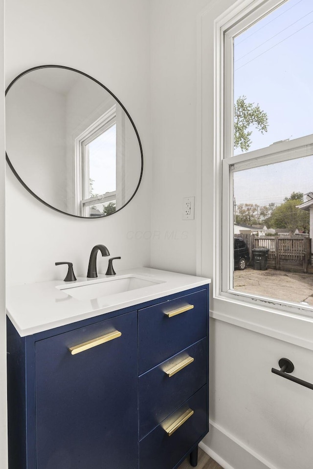 147 N Ogden Ave, Columbus, OH 43204 - bathroom with vanity and a wealth of natural light