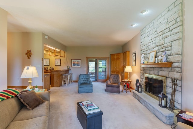 125 W Woodmere Dr, Tiffin, OH 44883 - living area with baseboards, carpet, and a fireplace