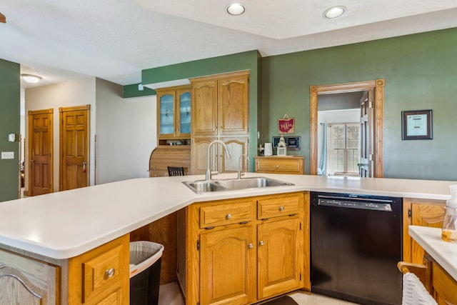 125 W Woodmere Dr, Tiffin, OH 44883 - kitchen featuring glass insert cabinets, black dishwasher, light countertops, brown cabinets, and a sink