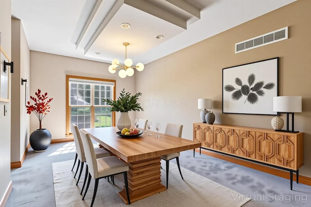 125 W Woodmere Dr, Tiffin, OH 44883 - dining space with baseboards, visible vents, light carpet, and an inviting chandelier