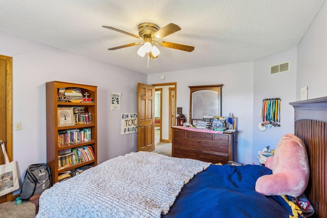 125 W Woodmere Dr, Tiffin, OH 44883 - carpeted bedroom with a ceiling fan and visible vents