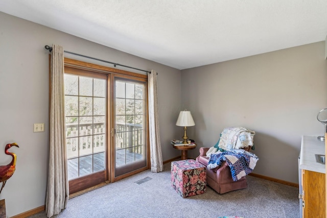 125 W Woodmere Dr, Tiffin, OH 44883 - sitting room featuring baseboards, visible vents, and carpet