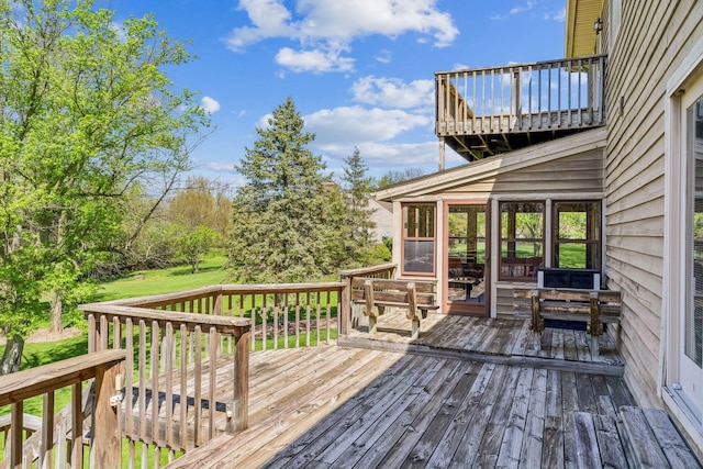 125 W Woodmere Dr, Tiffin, OH 44883 - deck featuring a sunroom