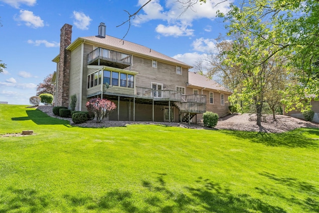 125 W Woodmere Dr, Tiffin, OH 44883 - rear view of property with a balcony, a deck, a chimney, stairs, and a yard
