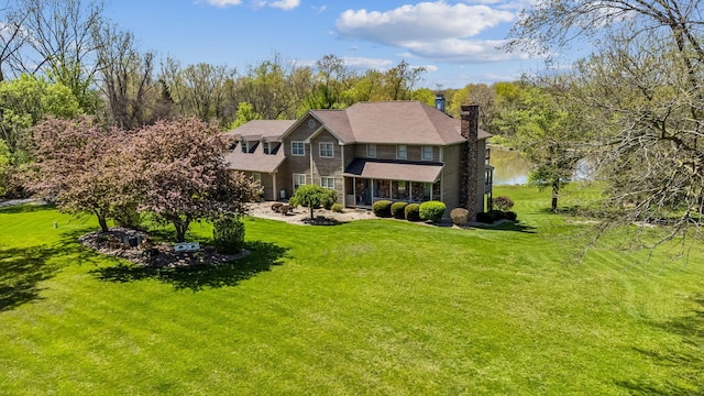 125 W Woodmere Dr, Tiffin, OH 44883 - exterior space with a chimney and a front lawn
