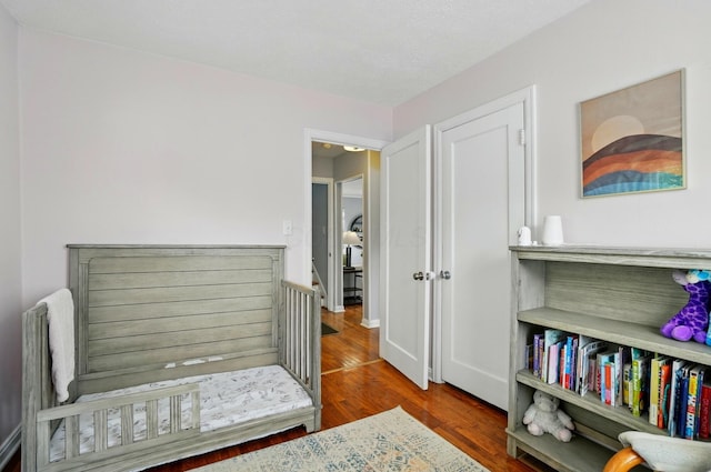 bedroom with wood finished floors