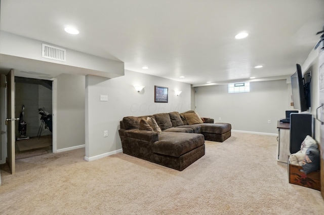 carpeted living room featuring visible vents, baseboards, and recessed lighting