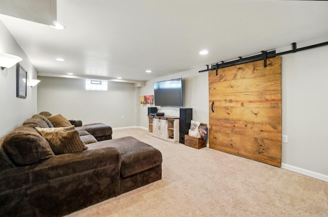 living room featuring baseboards, carpet flooring, recessed lighting, and a barn door
