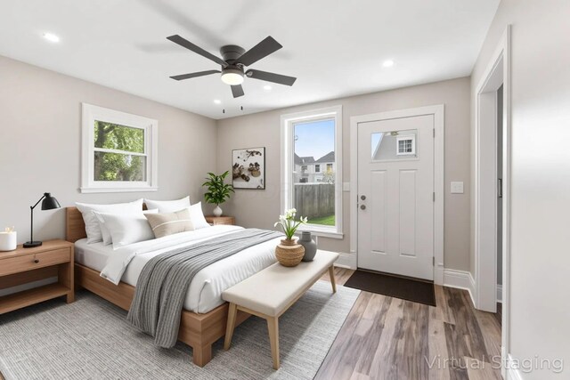61 Dakota Ave, Columbus, OH 43222 - bedroom with multiple windows, recessed lighting, and light wood-style flooring
