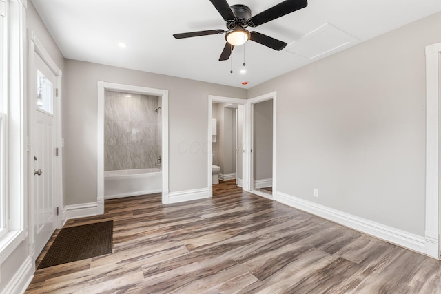 61 Dakota Ave, Columbus, OH 43222 - unfurnished bedroom featuring recessed lighting, baseboards, a ceiling fan, wood finished floors, and ensuite bathroom