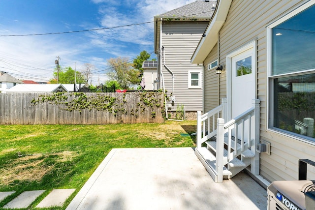 61 Dakota Ave, Columbus, OH 43222 - view of yard with fence, a patio area, and entry steps