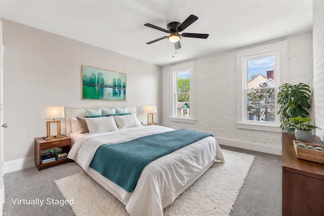 61 Dakota Ave, Columbus, OH 43222 - carpeted bedroom with baseboards and a ceiling fan