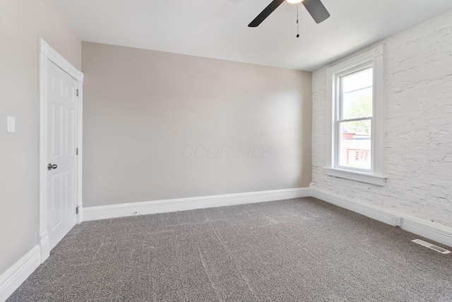 61 Dakota Ave, Columbus, OH 43222 - carpeted empty room with ceiling fan, visible vents, and baseboards