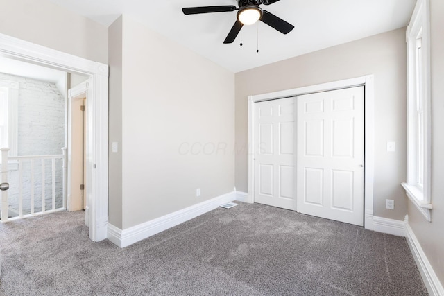61 Dakota Ave, Columbus, OH 43222 - unfurnished bedroom with carpet flooring, visible vents, and a closet