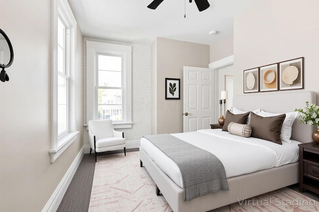 61 Dakota Ave, Columbus, OH 43222 - bedroom with baseboards, multiple windows, and ceiling fan