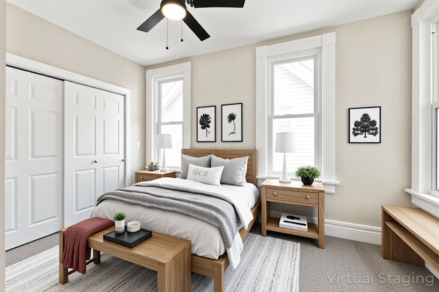 61 Dakota Ave, Columbus, OH 43222 - bedroom featuring ceiling fan, light carpet, baseboards, and a closet
