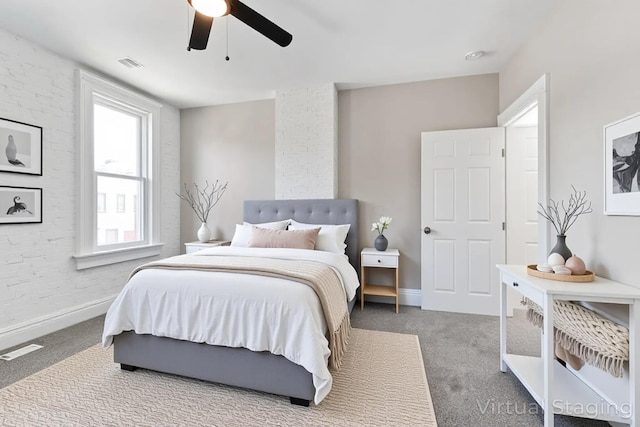 61 Dakota Ave, Columbus, OH 43222 - bedroom with baseboards, ceiling fan, carpet flooring, and visible vents