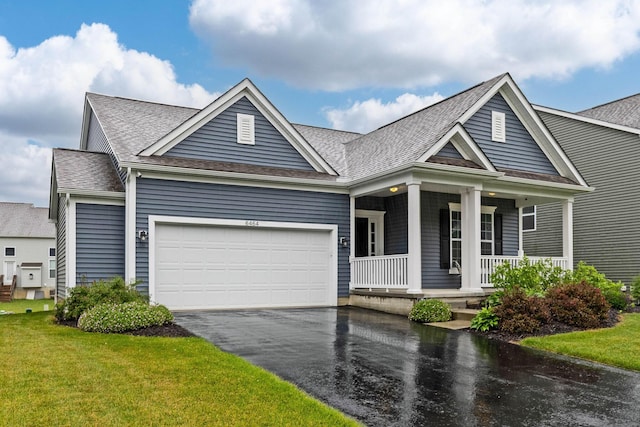 6464 Rockhold Dr, Westerville, OH 43081 - view of front of property with a porch, driveway, a shingled roof, an attached garage, and a front yard